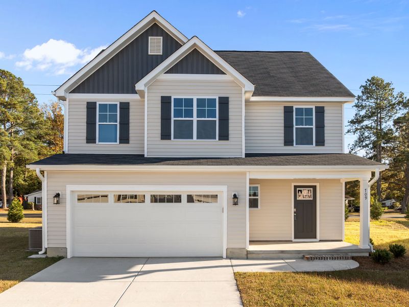 Front exterior of a new home in Arbor Hills South, Greenville, NC, highlighting curb appeal (Image 1). Front exterior of a new home in Arbor Hills South, Greenville, NC, highlighting curb appeal (Image 1).