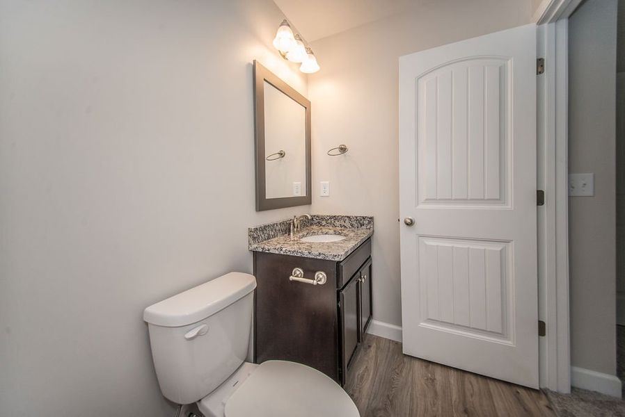 Representative furnished interior of a home built from the Quincy by Enchanted Homes in Lonesome Dove, San Antonio (Image 29).