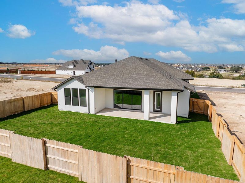 Exterior details and patio area of a home in Lariat - 70', Liberty Hill (Image 3). Exterior details and patio area of a home in Lariat - 70', Liberty Hill (Image 3).
