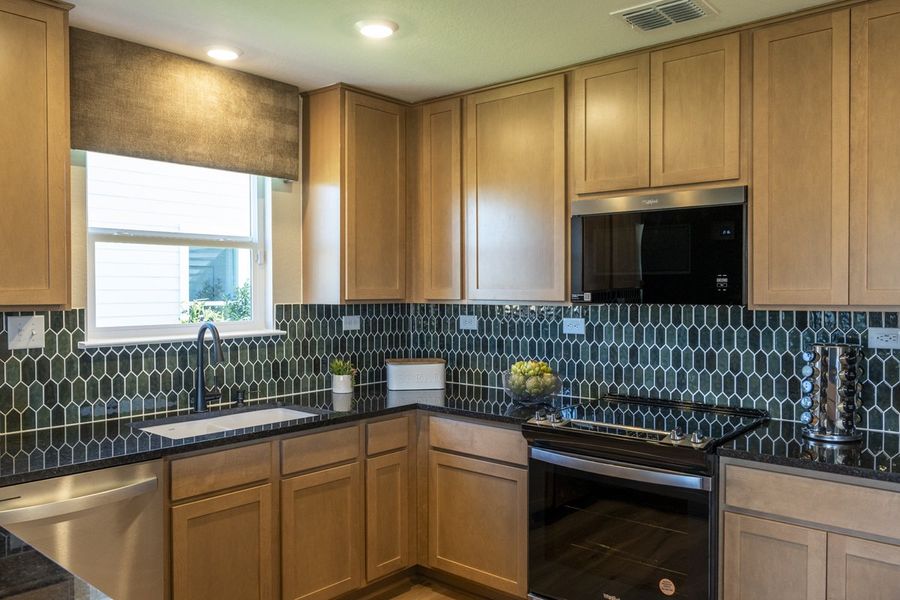 Image 21 representing the 2246 by KB Home in Legend Heights - Heritage Collection, New Braunfels, TX.
