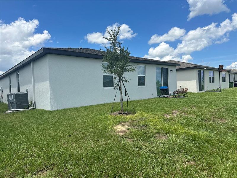 Exterior details and patio area of a home in Villamar - Signature Series, Winter Haven (Image 3).