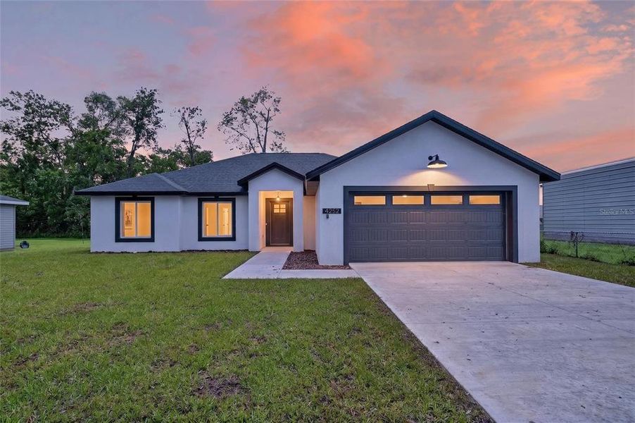 Front exterior of a new home in , Summerfield, FL, highlighting curb appeal (Image 2). Front exterior of a new home in , Summerfield, FL, highlighting curb appeal (Image 2).