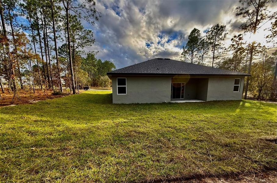 Exterior details and patio area of a home in , Citrus Springs (Image 35).