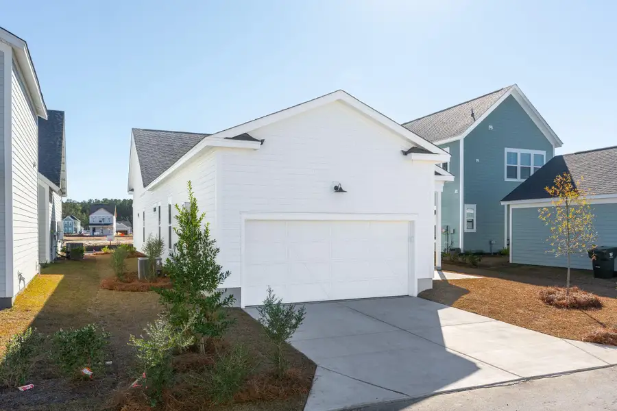 Front exterior of a new home in Nexton, Summerville, SC, highlighting curb appeal (Image 4).