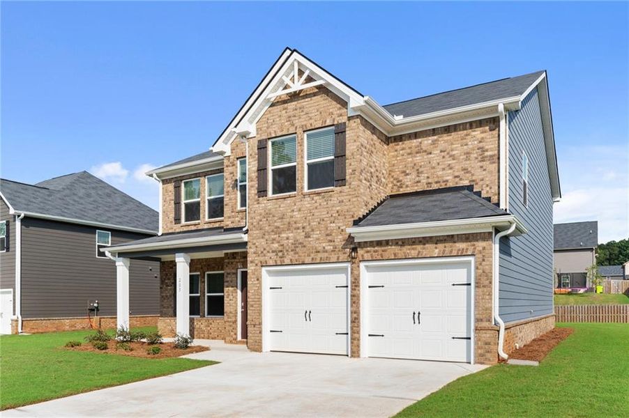 Front exterior of a new home in Southern Hills, McDonough, GA, highlighting curb appeal (Image 2). Front exterior of a new home in Southern Hills, McDonough, GA, highlighting curb appeal (Image 2).