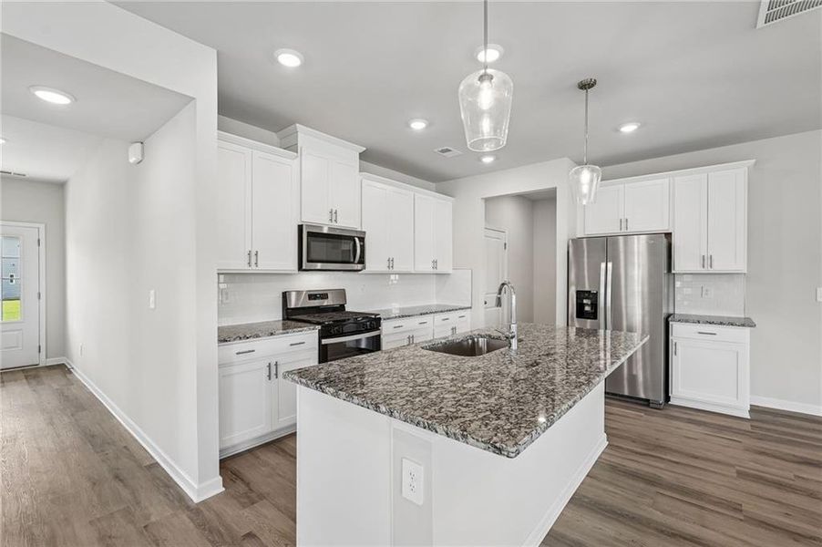 Furnished interior view inside a new home in Northwoods at Mirror Lake, Villa Rica (Image 10).