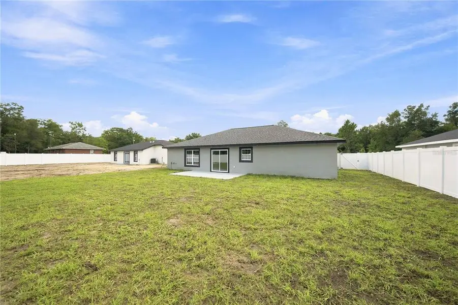 Exterior details and patio area of a home in , Ocala (Image 16).