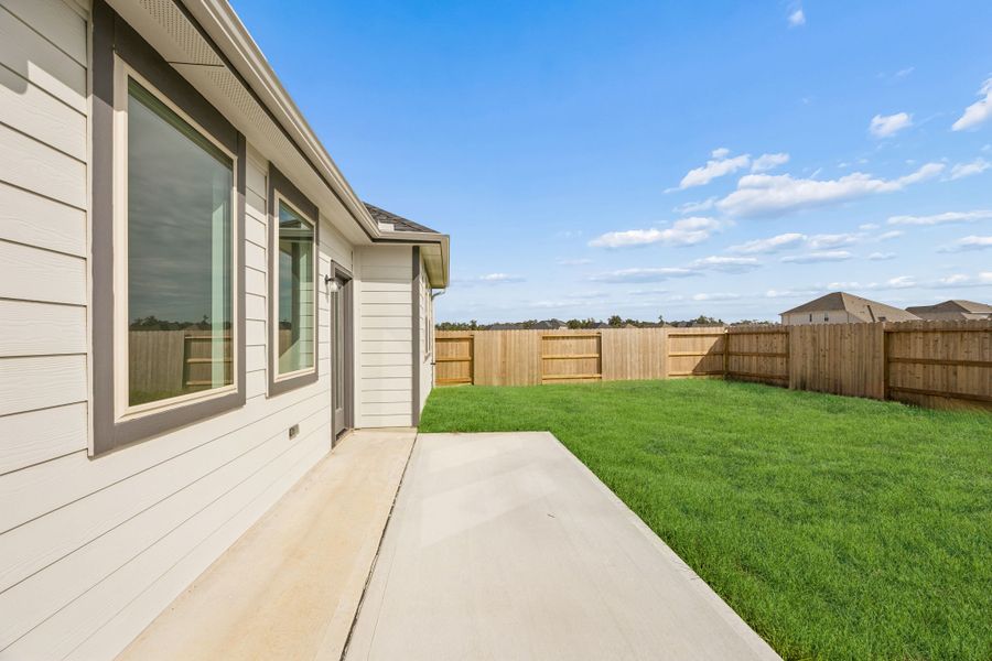 Exterior details and patio area of a home in Riviera Pines, Huffman (Image 3). Exterior details and patio area of a home in Riviera Pines, Huffman (Image 3).