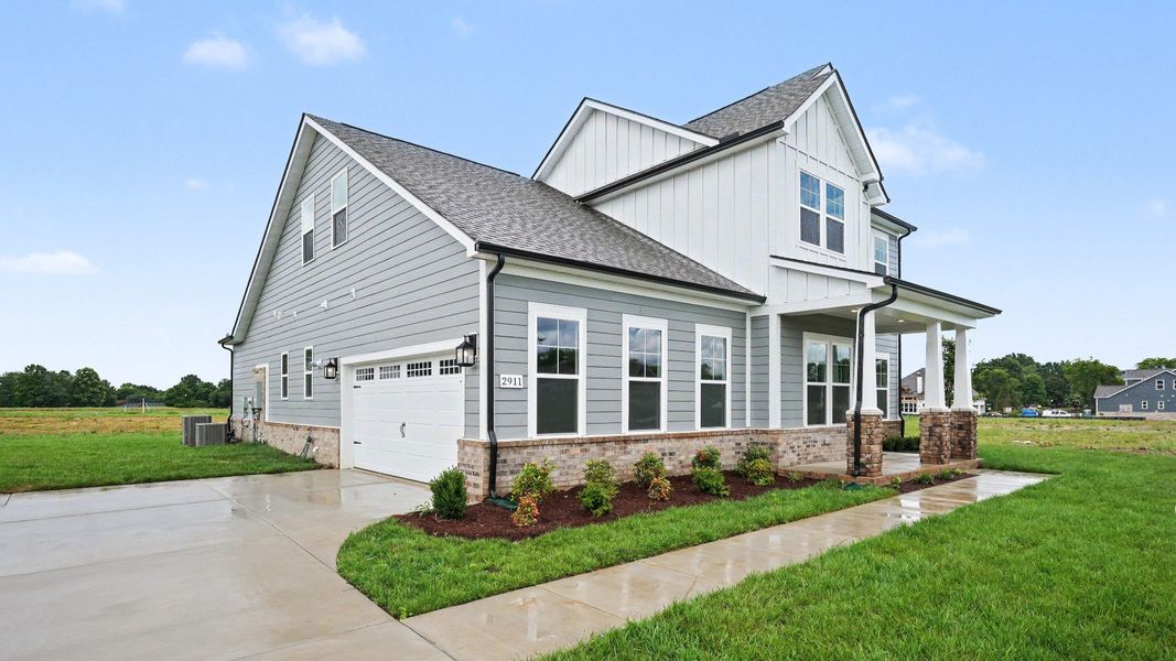 Front exterior with side-load garage