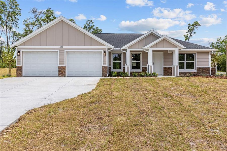 Front exterior of a new home in , Dunnellon, FL, highlighting curb appeal (Image 22). Front exterior of a new home in , Dunnellon, FL, highlighting curb appeal (Image 22).
