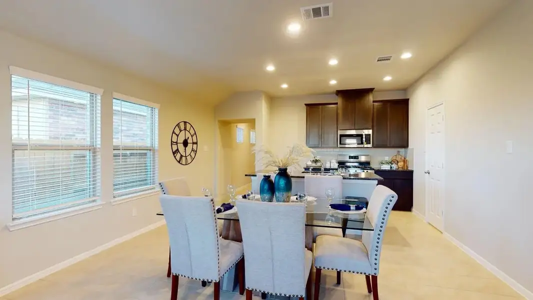 Furnished interior view inside a new home in Sunterra, Katy (Image 7).