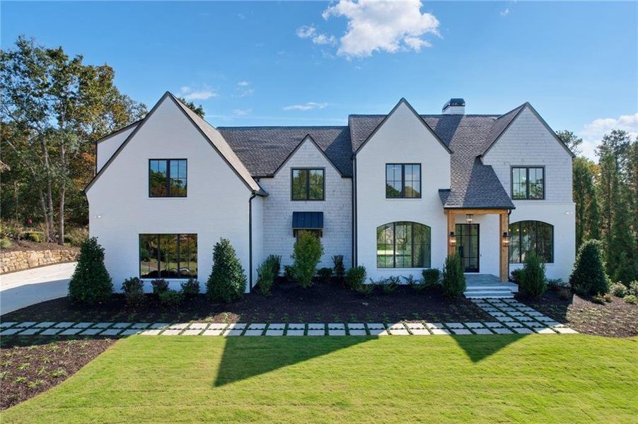 Front exterior of a new home in , Roswell, GA, highlighting curb appeal (Image 27). Front exterior of a new home in , Roswell, GA, highlighting curb appeal (Image 27).