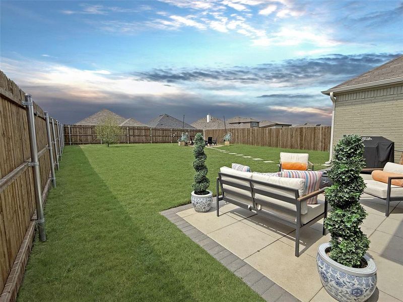 Fenced backyard with a patio area and an outdoor living space Fenced backyard with a patio area and an outdoor living space