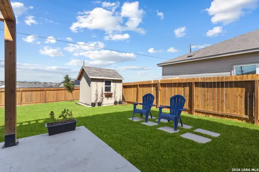 Exterior details and patio area of a home in Legend Pond, New Braunfels (Image 3).