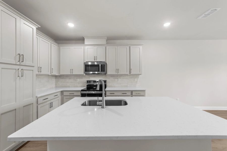 Furnished interior view inside a new home in Blue Heron Retreat, Little River (Image 7).