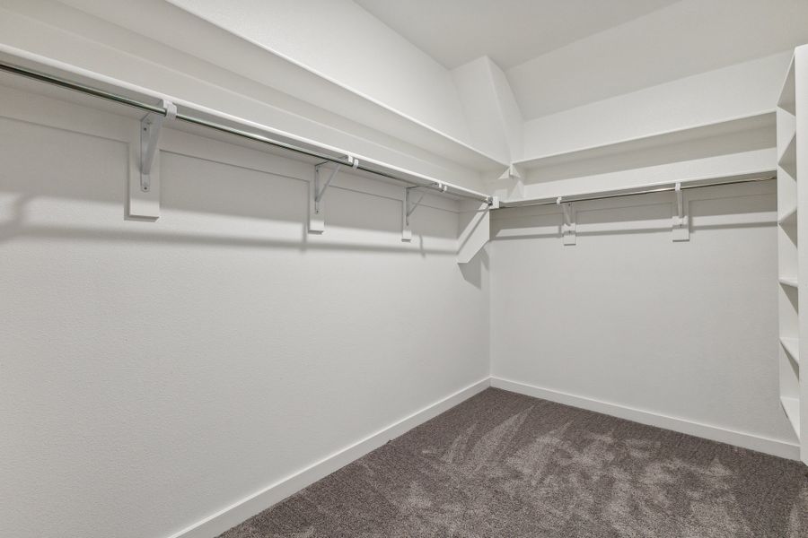 Primary Closet in the Hickory home plan by Trophy Signature Homes – REPRESENTATIVE PHOTO