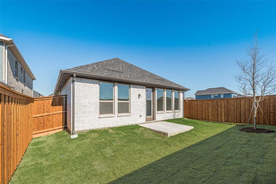 Exterior details and patio area of a home in Spiritas Ranch, Little Elm (Image 20).