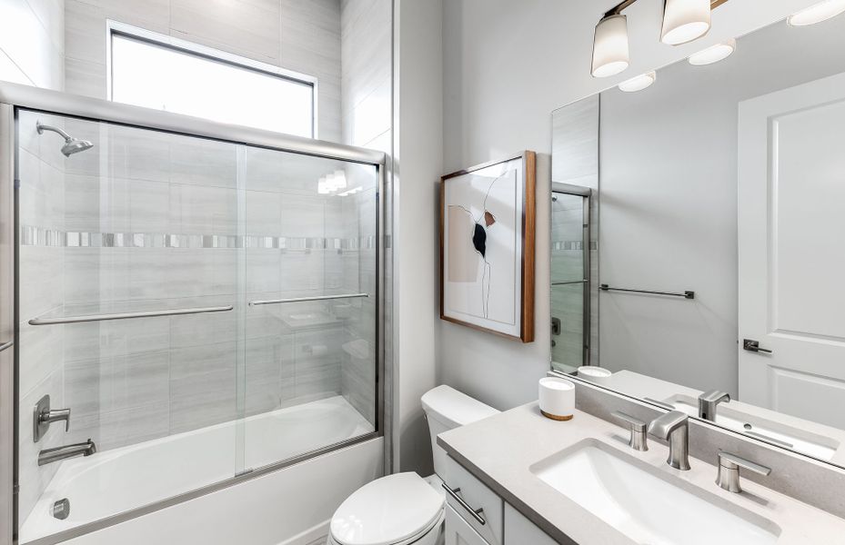 Representative furnished interior of a home built from the Layton by DiVosta in Terreno, Naples (Image 28).