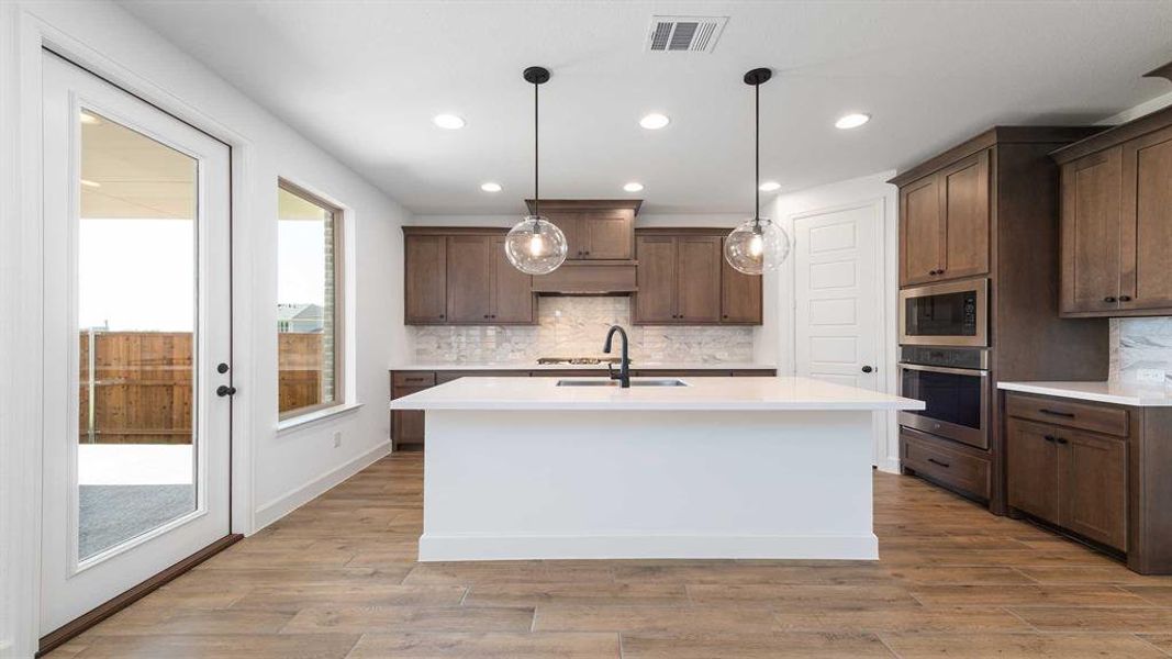 Furnished interior view inside a new home in The Heights At Uptown Celina 45', Celina (Image 6). Furnished interior view inside a new home in The Heights At Uptown Celina 45', Celina (Image 6).