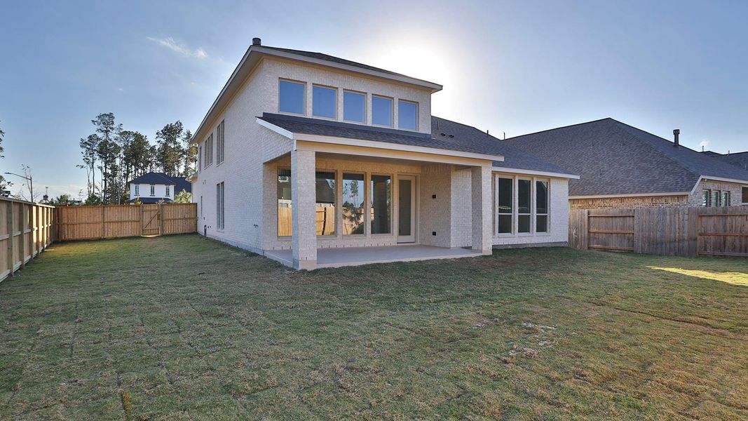 Exterior details and patio area of a home in Evergreen 50', Conroe (Image 2).