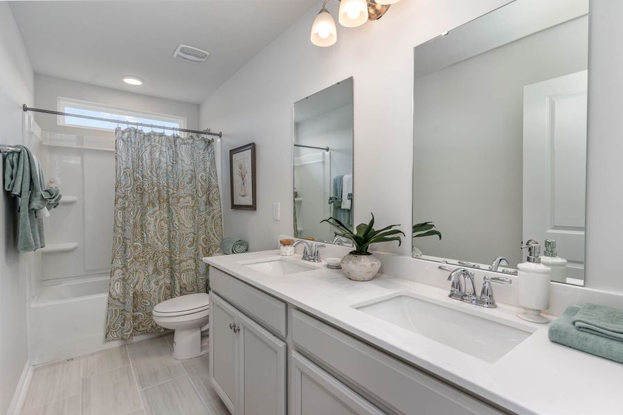 Representative furnished interior of a home built from the TILLMAN by D.R. Horton in Brunswick Plantation, Calabash (Image 24).