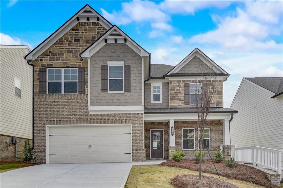 Front exterior of a new home in Summerlin, Winder, GA, highlighting curb appeal (Image 22). Front exterior of a new home in Summerlin, Winder, GA, highlighting curb appeal (Image 22).