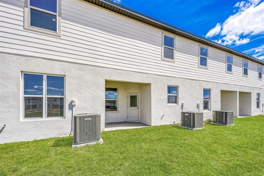 Exterior details and patio area of a home in Sol Vista, Dundee (Image 3).