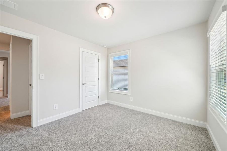 Spacious, unfurnished interior of a new home in Hemingway - Cottage Series, Cumming (Image 19). Spacious, unfurnished interior of a new home in Hemingway - Cottage Series, Cumming (Image 19).