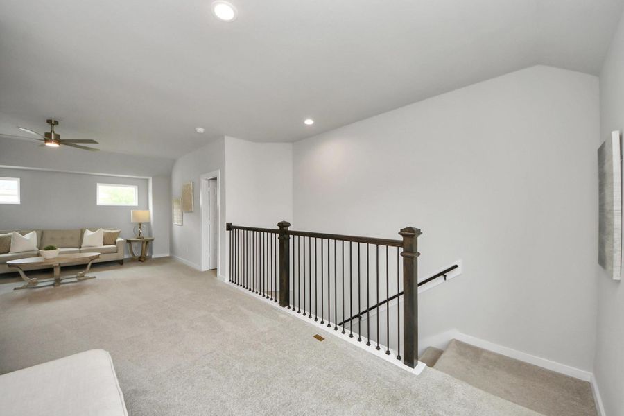 Come upstairs and enjoy a day of leisure in this fabulous game room! This is the perfect hangout spot or adult game room! Features plush carpet, high ceilings, custom paint and windows for plenty of natural light. Come upstairs and enjoy a day of leisure in this fabulous game room! This is the perfect hangout spot or adult game room! Features plush carpet, high ceilings, custom paint and windows for plenty of natural light.