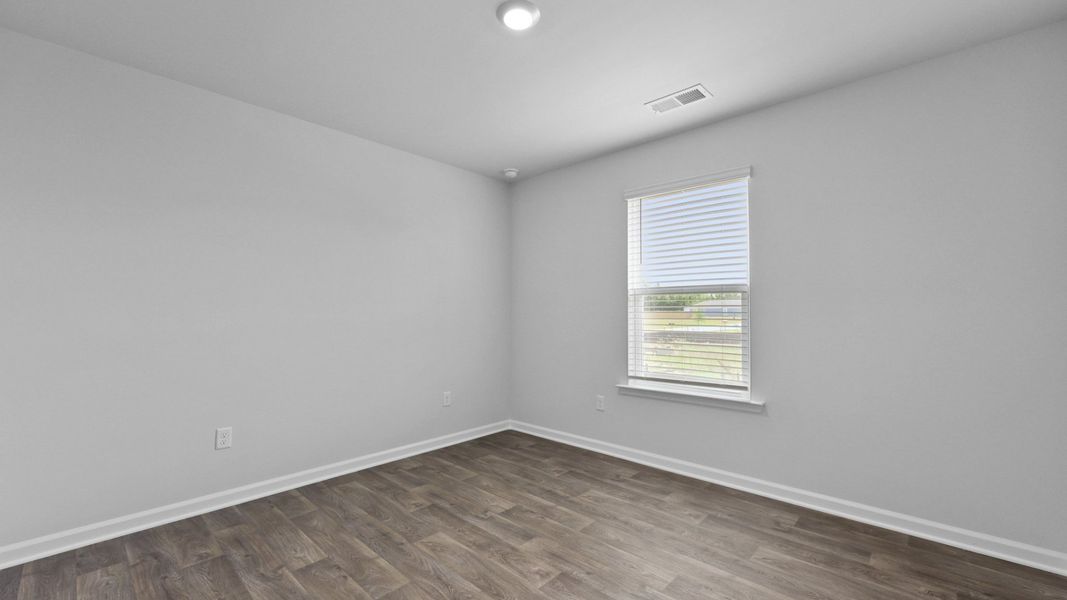 Representative unfurnished interior of a home built from the Cali by D.R. Horton in Center Pointe, Santee (Image 18).