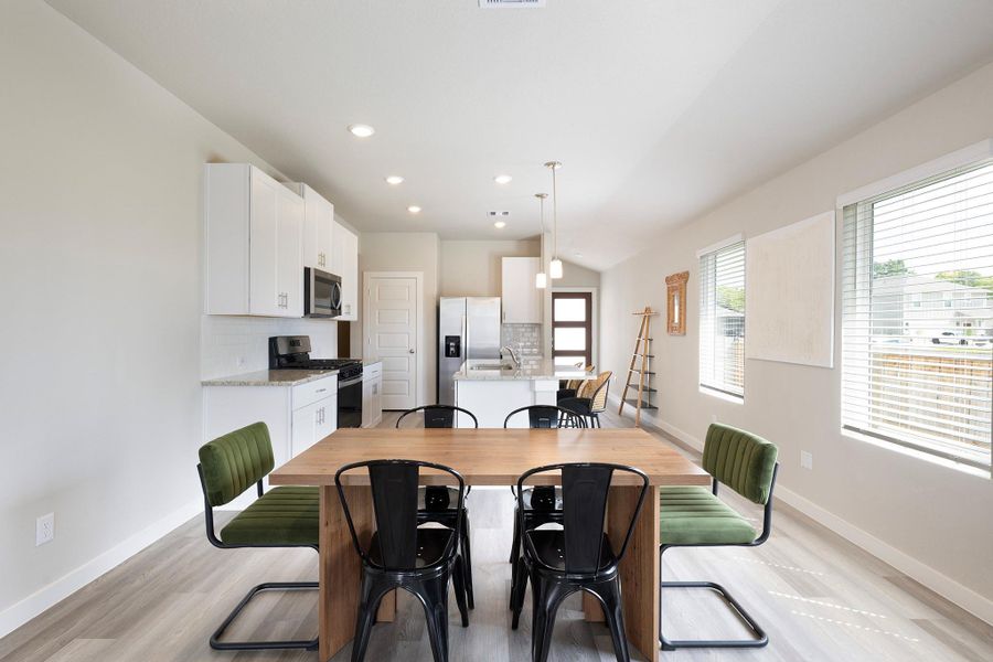 The kitchen flows directly into a dining area ready to host your meals! The kitchen flows directly into a dining area ready to host your meals!