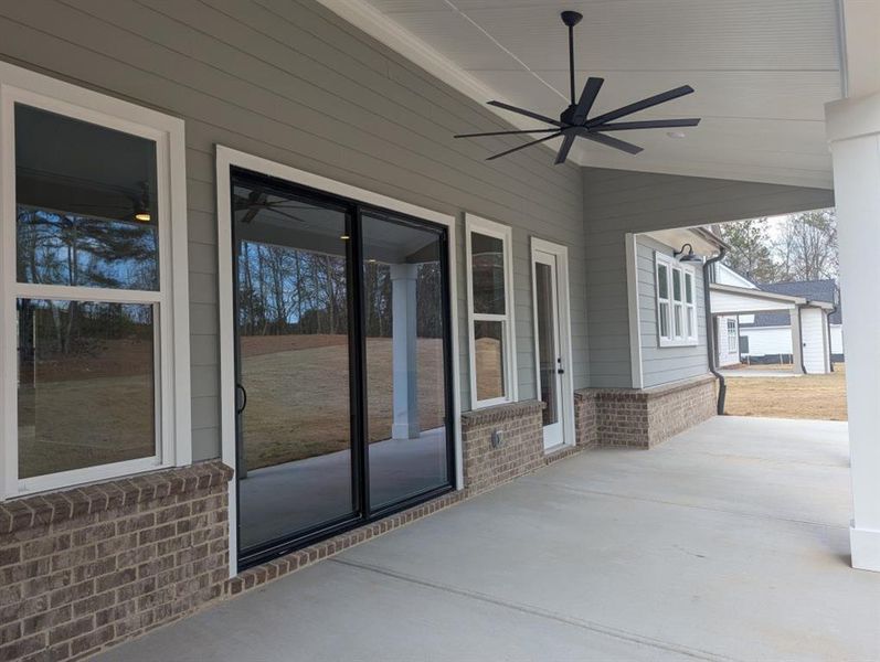 Exterior details and patio area of a home in Arden on Lanier, Cumming (Image 21).