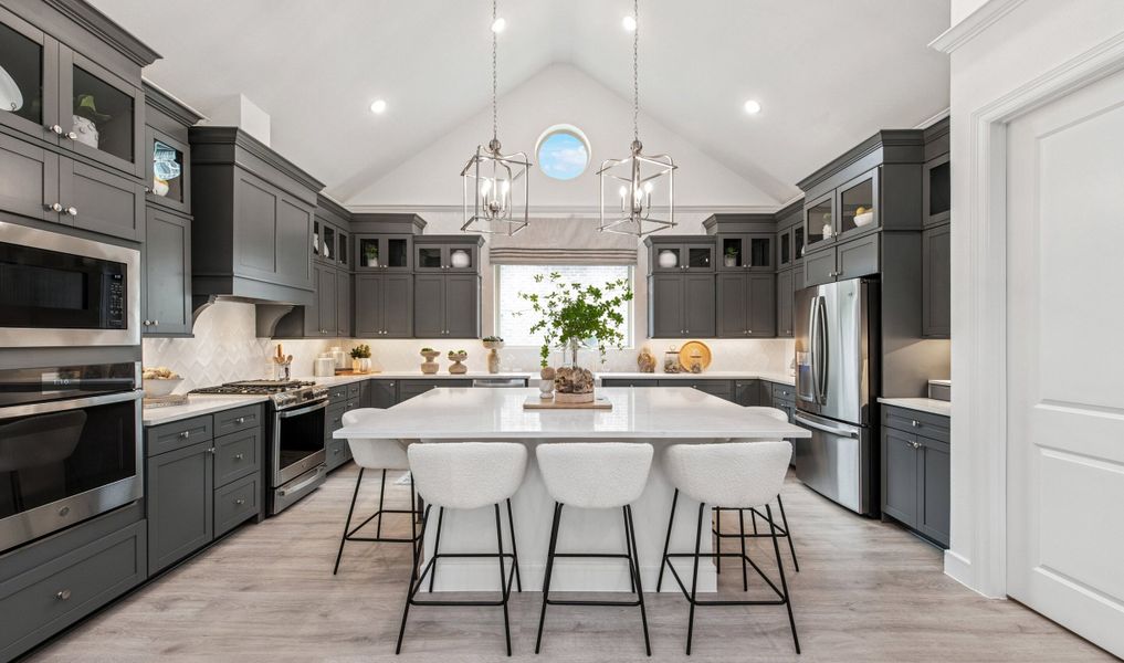Kitchen with stunning stacked cabinetry with glass-front uppers Kitchen with stunning stacked cabinetry with glass-front uppers