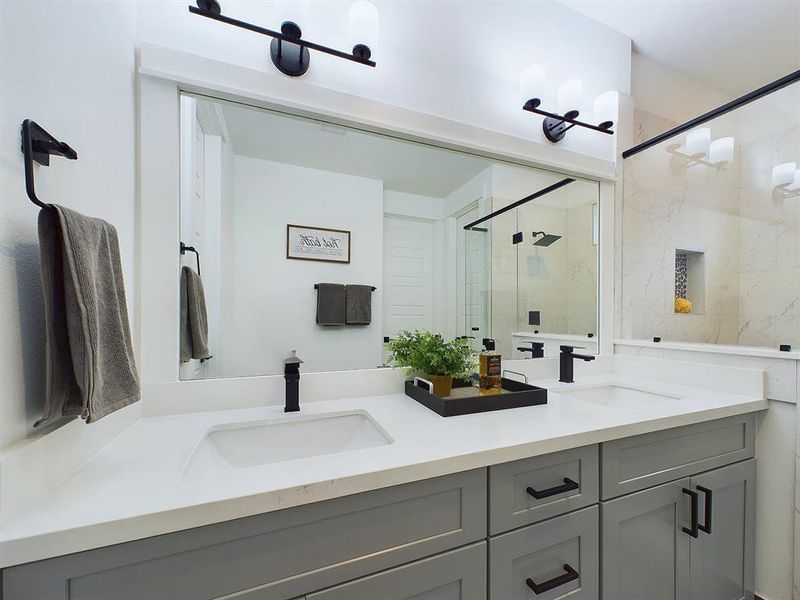 Beautiful Primary Bath with Quartz double sink vanity top and soft close drawers and doors.