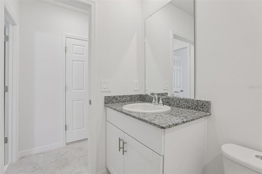 Furnished interior view inside a new home in Deer Run at Crosswinds, Davenport (Image 32).