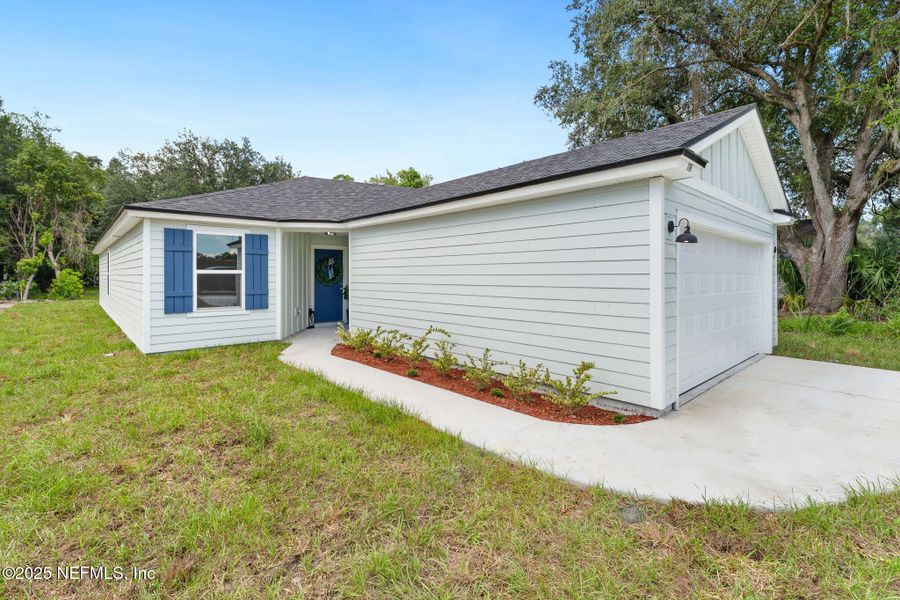Front exterior of a new home in , Green Cove Springs, FL, highlighting curb appeal (Image 31).