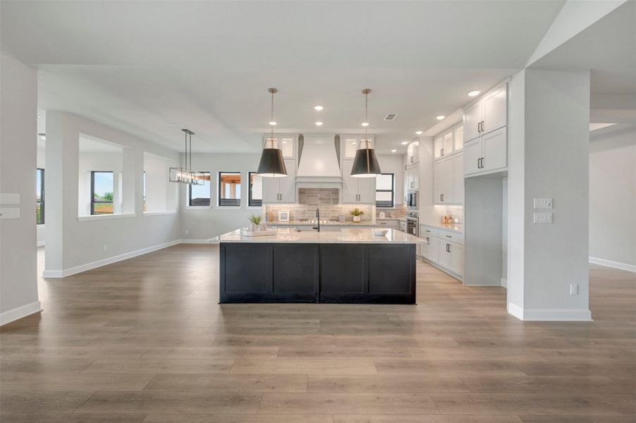 Furnished interior view inside a new home in Harvest Green 65', Richmond (Image 6).