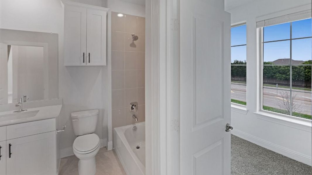 Representative furnished interior of a home built from the Appaloosa by D.R. Horton in The Avenue, Allen (Image 14).