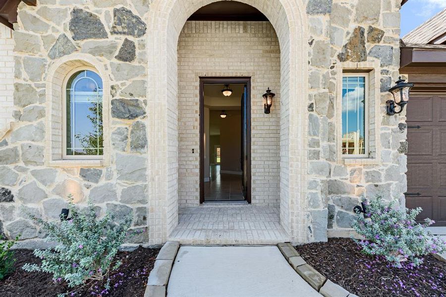 Front exterior of a new home in Hampton Park, Glenn Heights, TX, highlighting curb appeal (Image 24). Front exterior of a new home in Hampton Park, Glenn Heights, TX, highlighting curb appeal (Image 24).