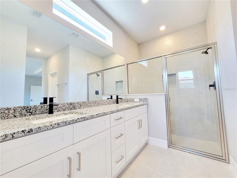 PRIMARY BATHROOM WITH DUAL SINKS