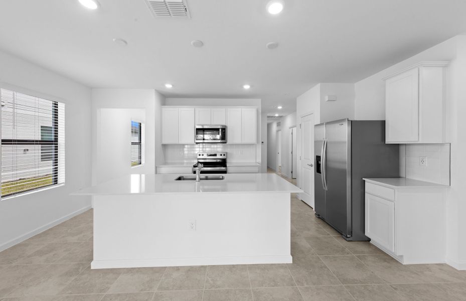 Furnished interior view inside a new home in Caloosa Cove, Labelle (Image 15).