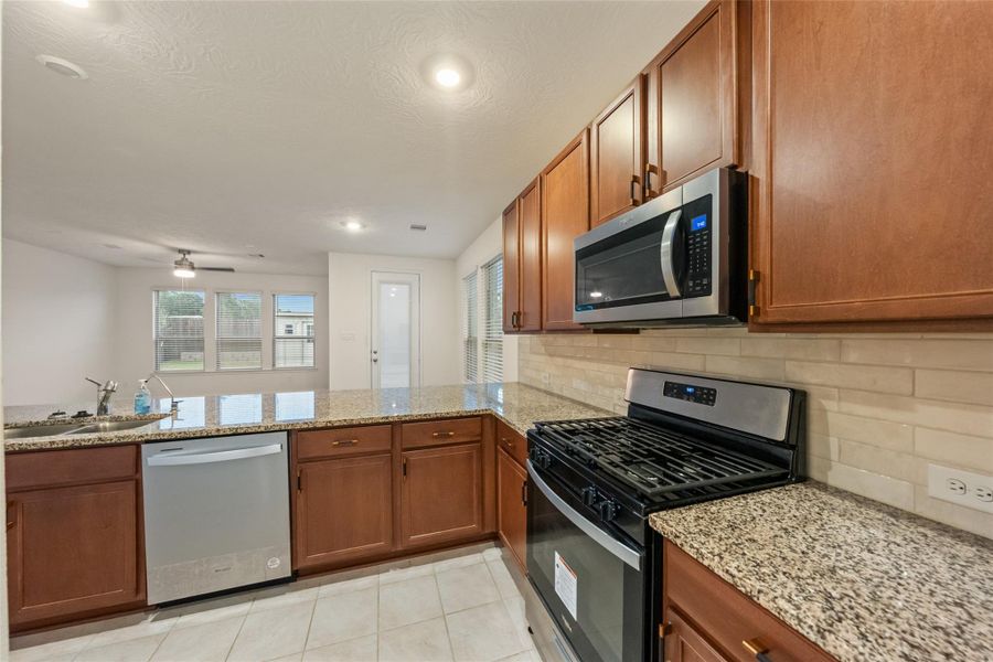 Furnished interior view inside a new home in Grace Landing, Willis (Image 6).