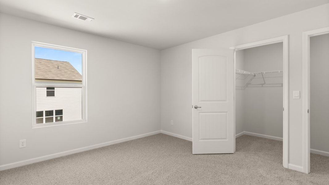 Representative unfurnished interior of a home built from the Salem by D.R. Horton in South Wind, South Fulton (Image 29).
