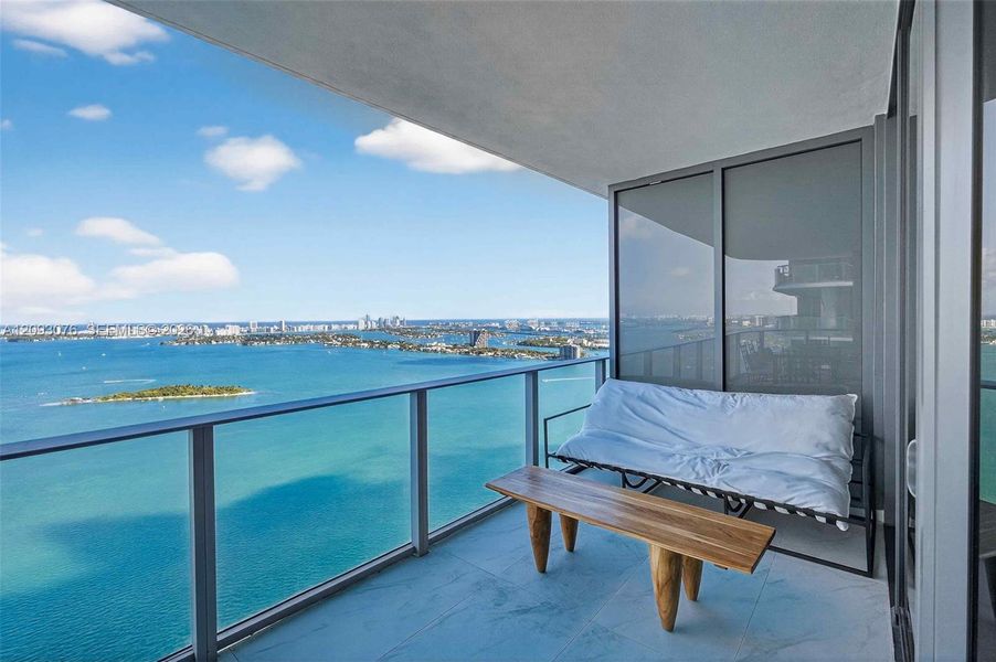 Exterior details and patio area of a home in Aria Reserve, Miami (Image 2).