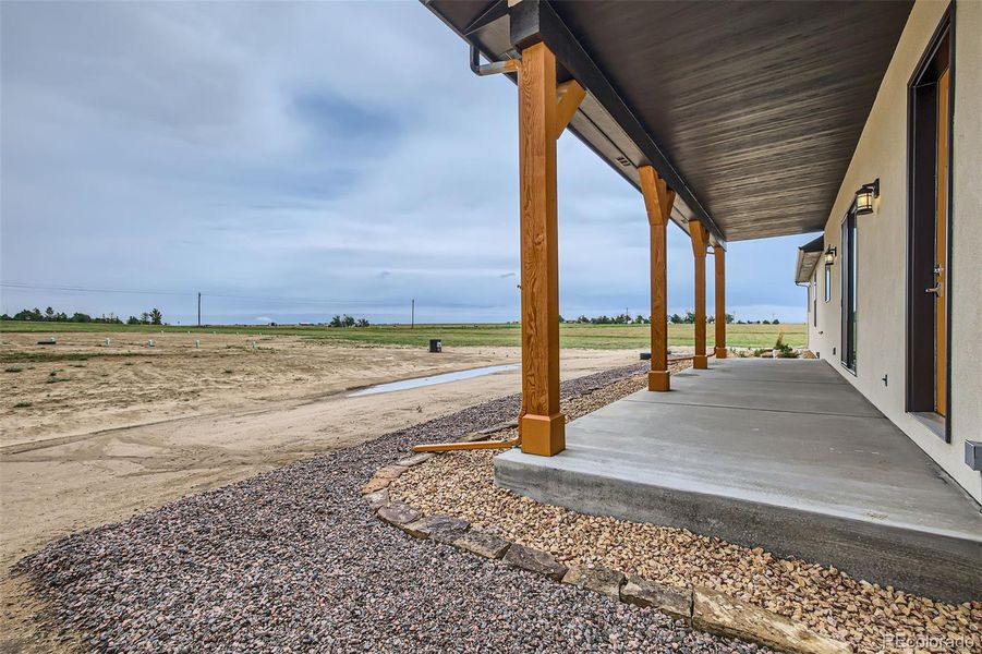 Oversized back Porch (8' wide)...great space for grilling and views!