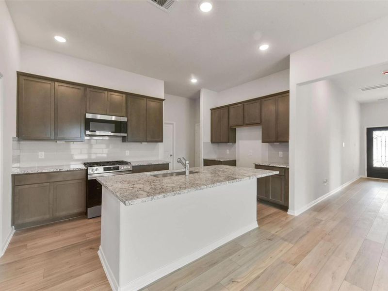 Furnished interior view inside a new home in Windmill Estates, Magnolia (Image 4). Furnished interior view inside a new home in Windmill Estates, Magnolia (Image 4).