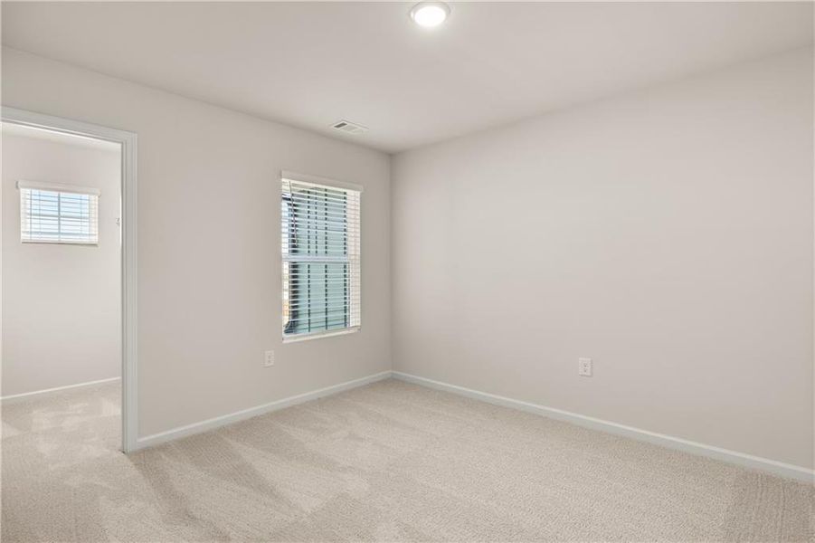 Spacious, unfurnished interior of a new home in Lake Carlton, Loganville (Image 25).