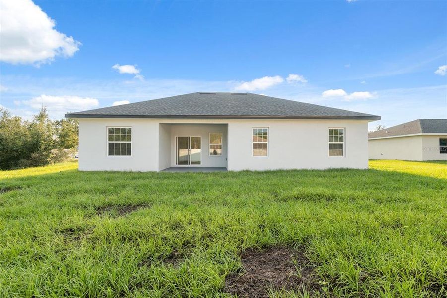 Front exterior of a new home in , Ocala, FL, highlighting curb appeal (Image 21). Front exterior of a new home in , Ocala, FL, highlighting curb appeal (Image 21).