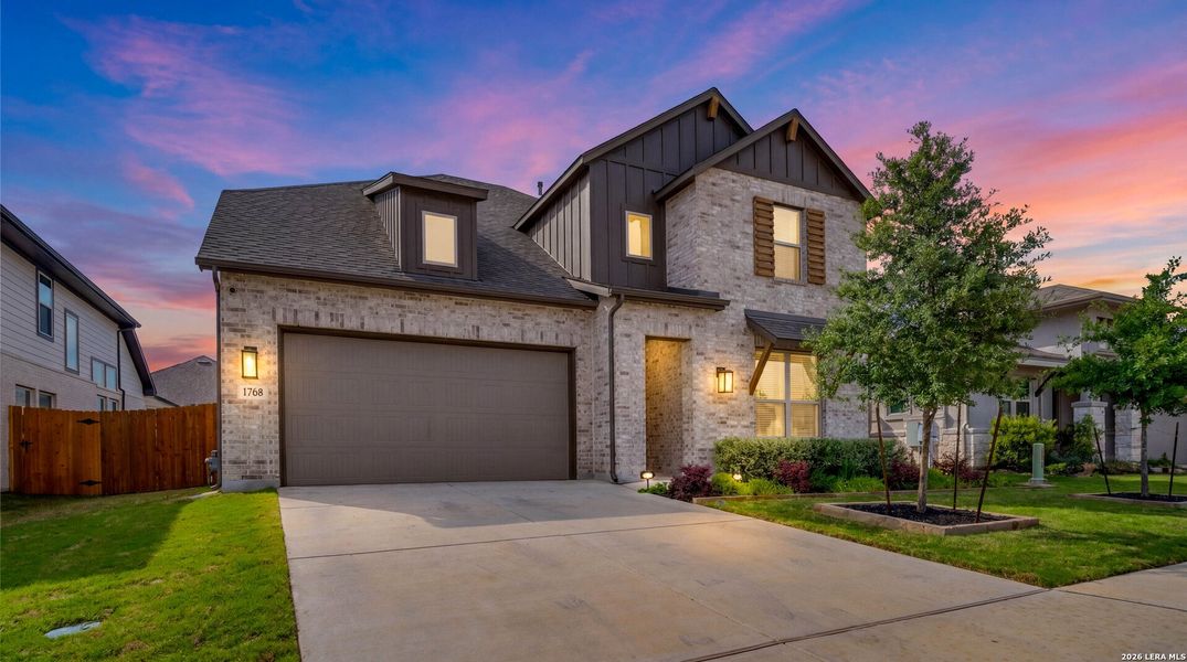 Front exterior of a new home in Meyer Ranch, New Braunfels, TX, highlighting curb appeal (Image 23).