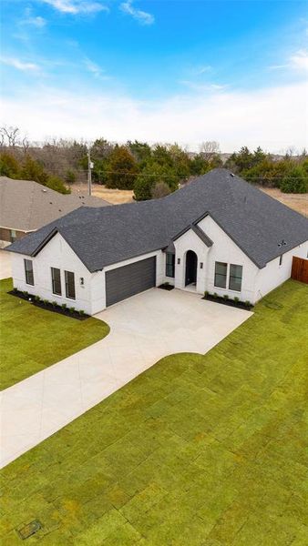 Front exterior of a new home in , Glenn Heights, TX, highlighting curb appeal (Image 21).